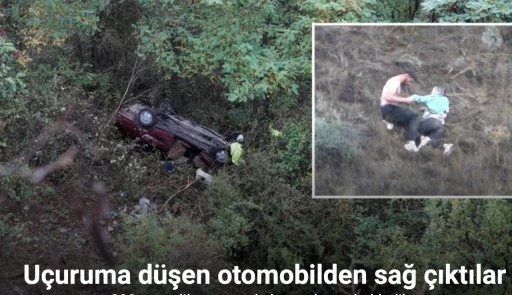 Uçuruma düşen otomobilden sağ çıktılar